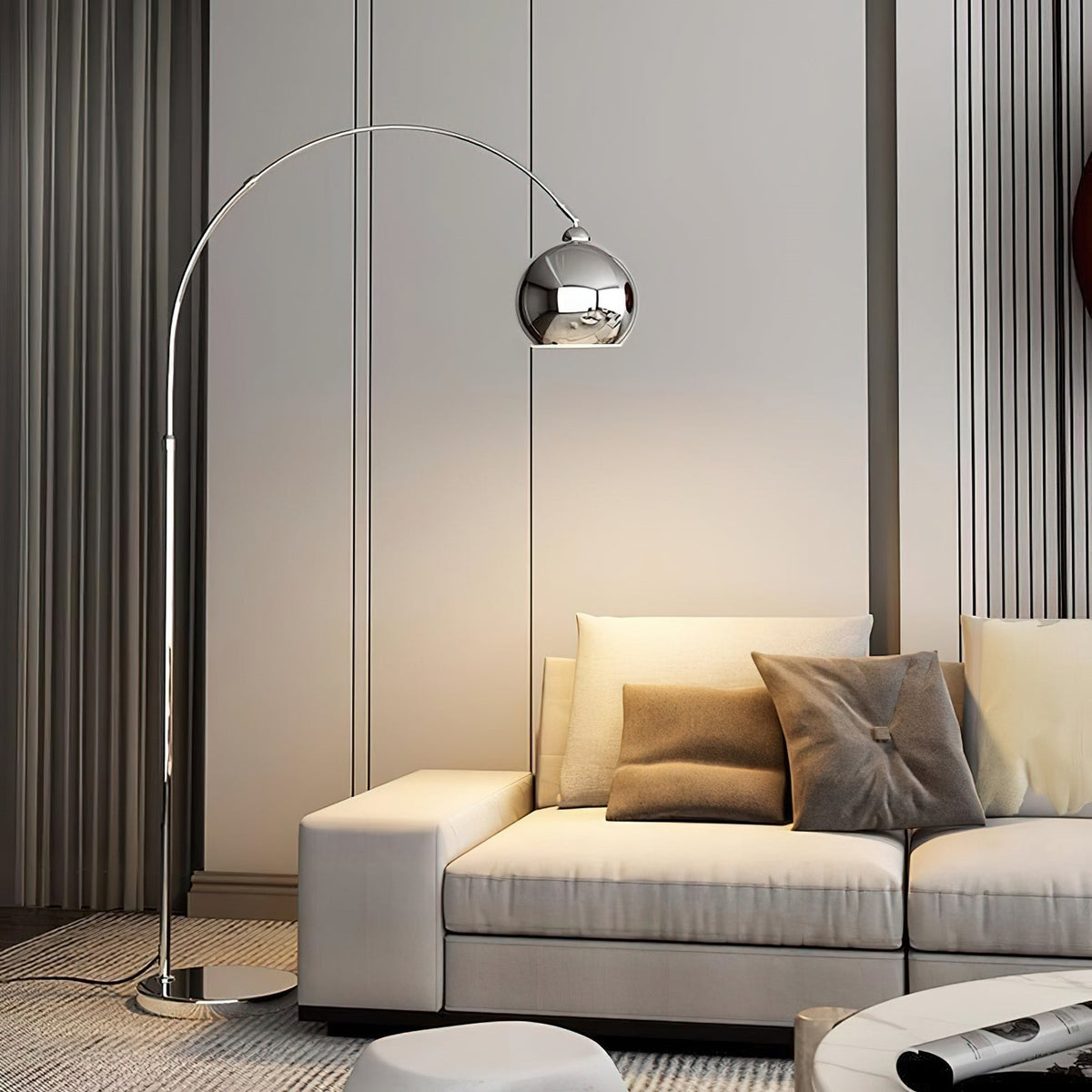 Maintained House Globe Arc Floor Lamp - Chrome beside a sofa