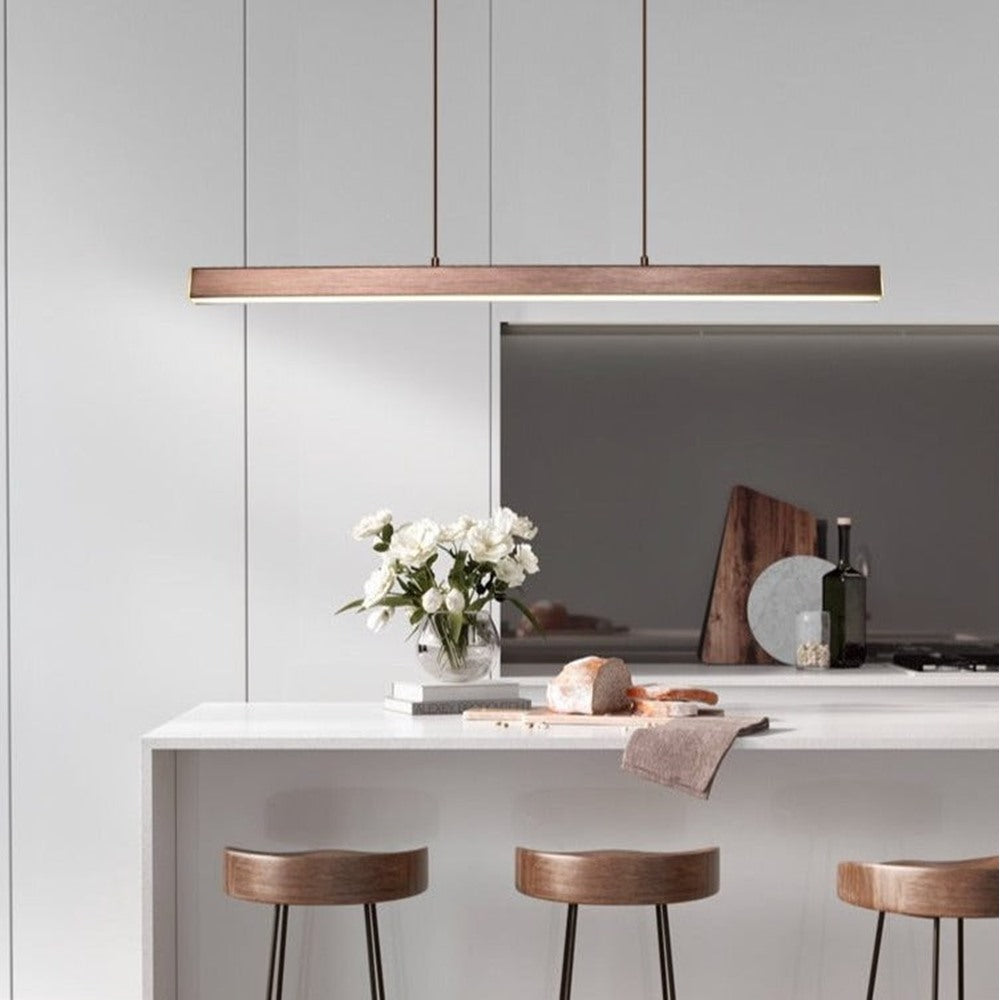 Maintained House Linear LED Bar Pendant Light - Brushed Coffee over a kitchen island
