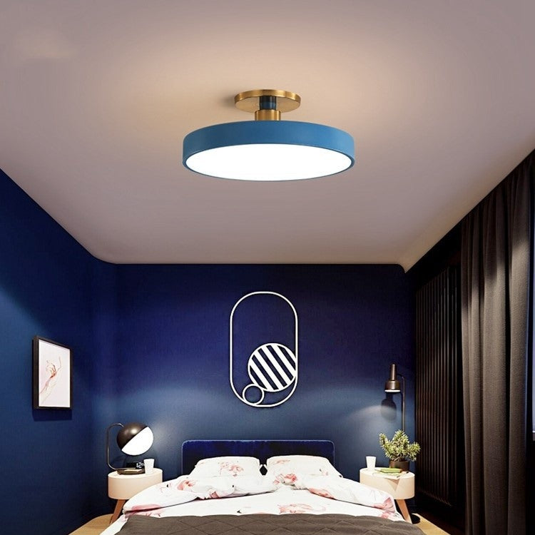 Maintained House Macaron Drum LED Ceiling Light - Blue in a navy bedroom
