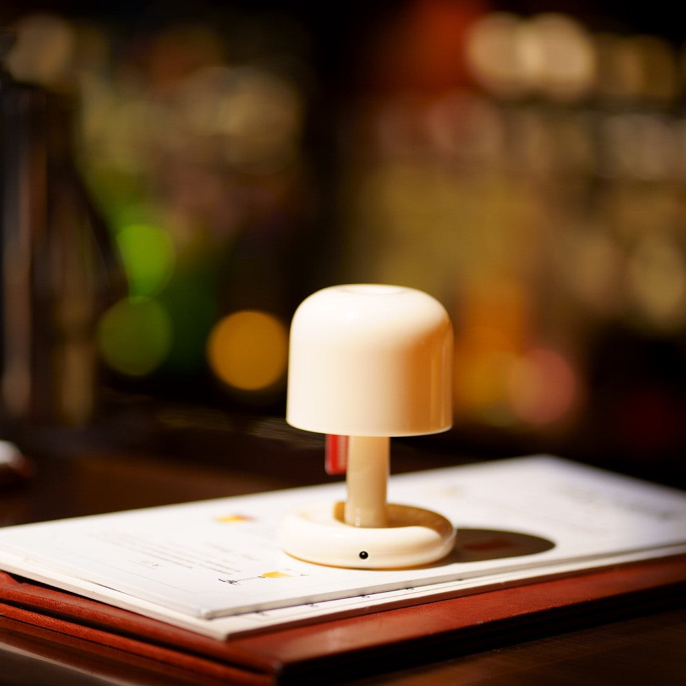 Maintained House Mini Sunset Mushroom Lamp - On an open book