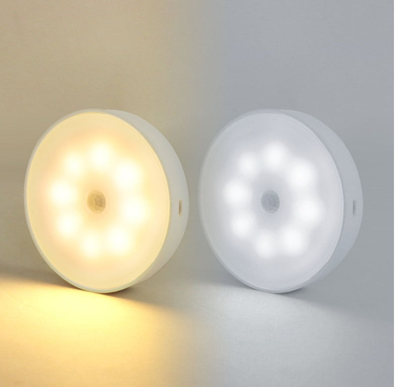 Maintained House Motion Sensor Puck Light - Warm White next to Cool White