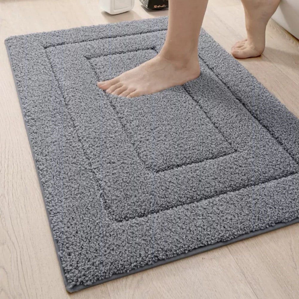 Maintained House Plush Microfiber Bath Mat - Gray, underfoot on a wood floor