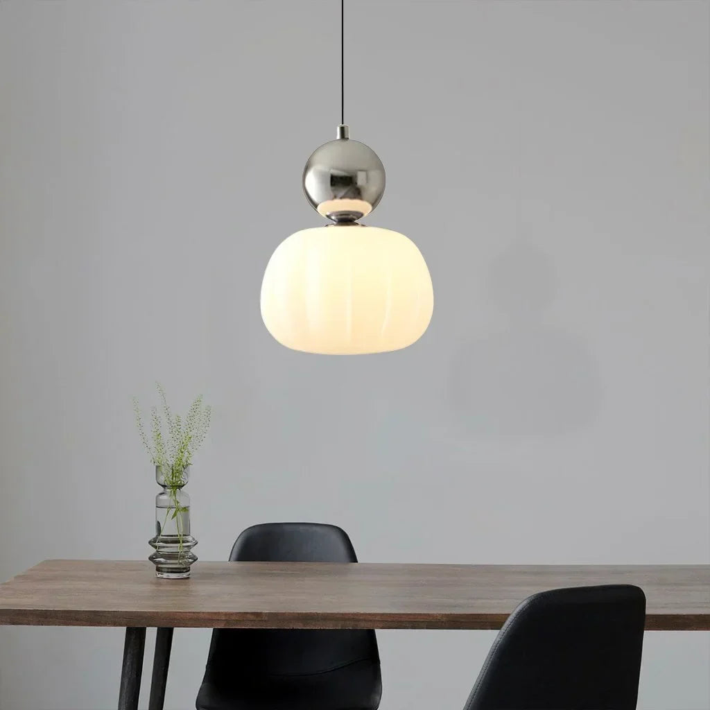 Maintained House Pumpkin Pendant Light - Single Pendant in Chrome above a dining table
