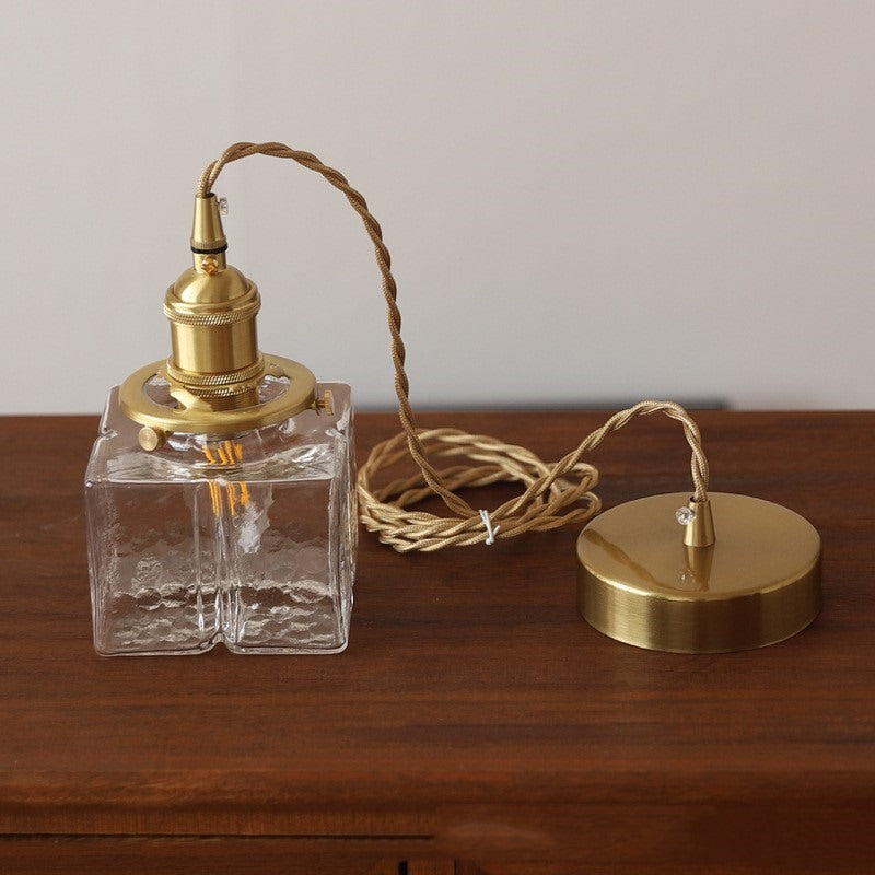 Maintained House Rippled Glass Pendant Light - Cube with the brass-finish canopy and braided cord