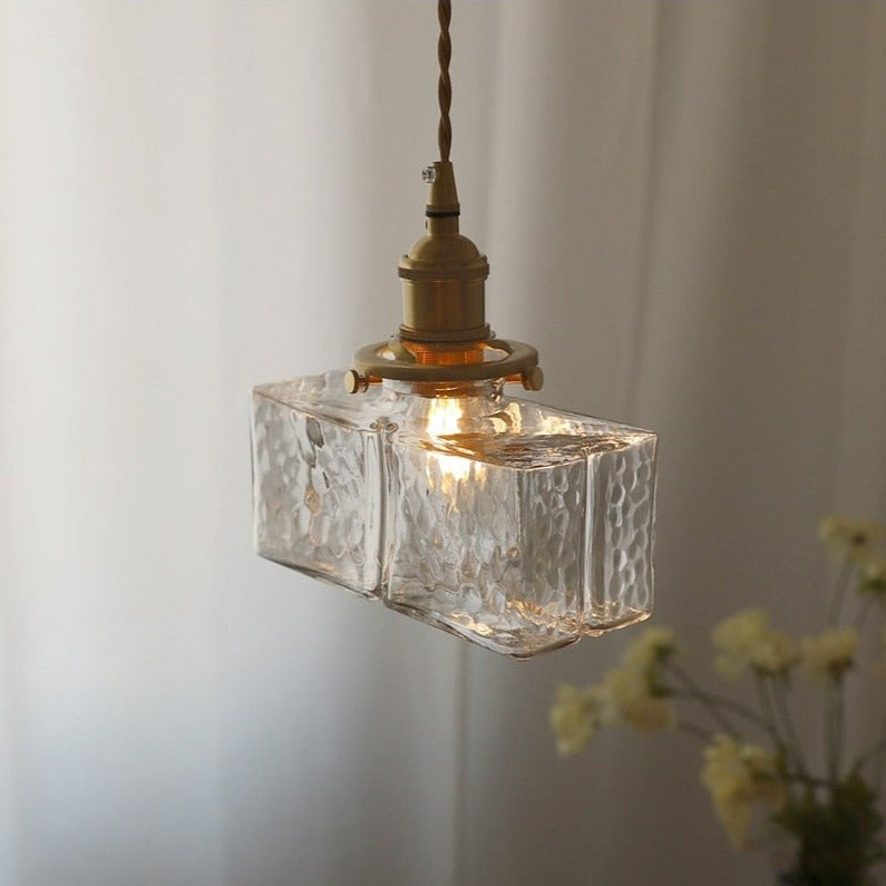 Maintained House Rippled Glass Pendant Light - Close-up of the Wide Rectangle hammered glass shade, lit