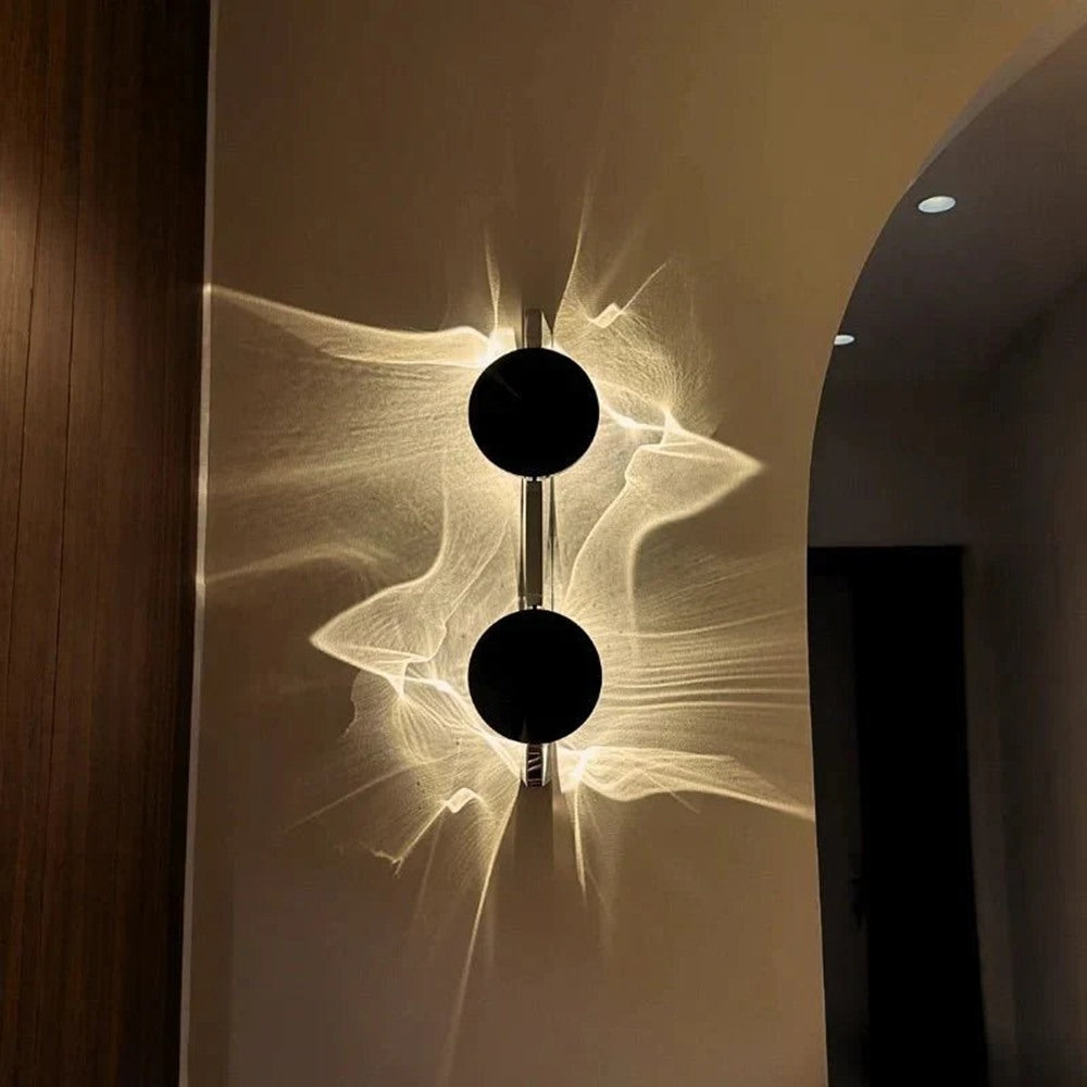 Maintained House Rotating Ripple Light Wall Sconce - Double lamp beside an arched doorway