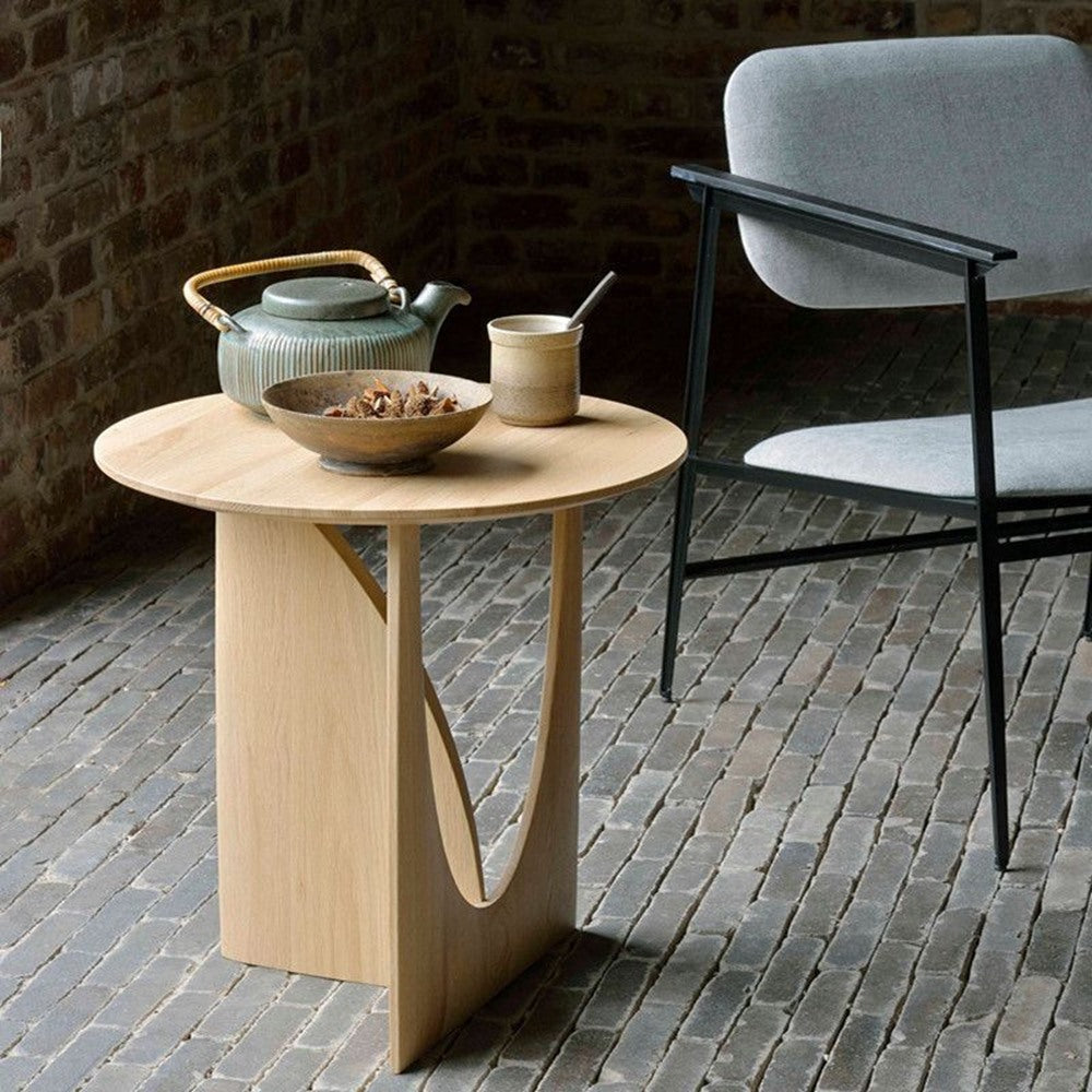 Maintained House Sculpted Round Side Table - Natural with a tea set