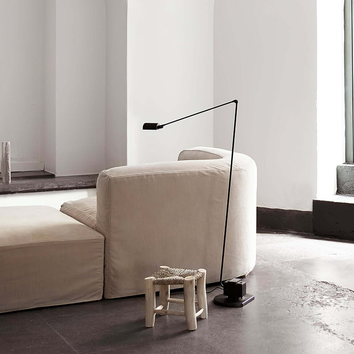 Maintained House Slim Swing Arm LED Floor Lamp - Beside a sofa