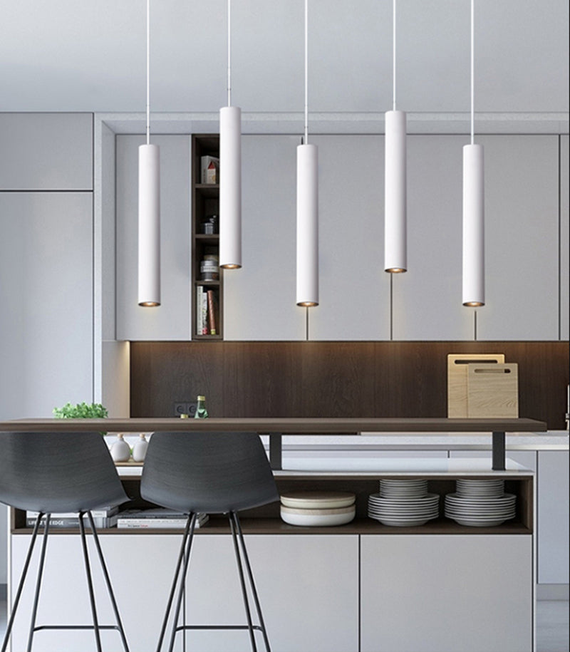 Maintained House Slim Tube LED Pendant Light - White tubes over a kitchen island