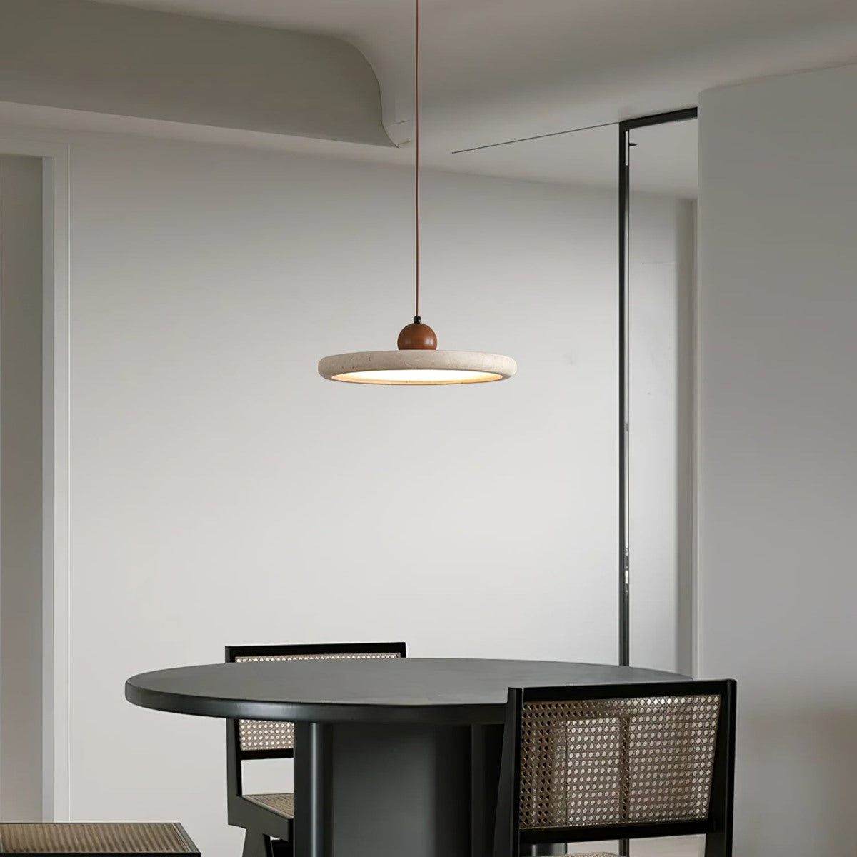 Maintained House Travertine Disc Pendant Light - Over a round dining table