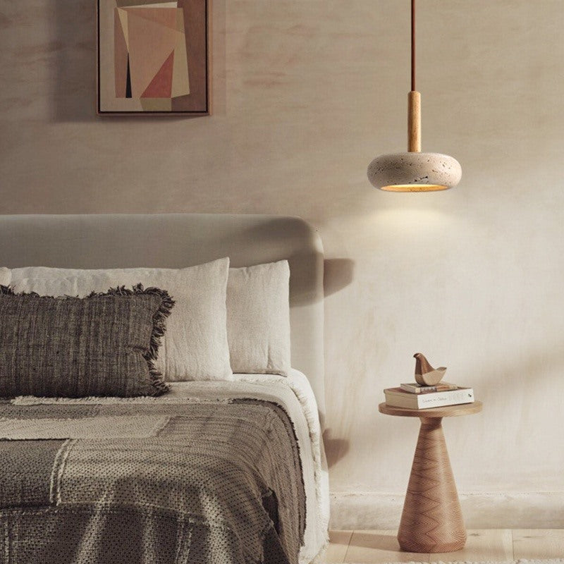 Maintained House Travertine Disc Pendant Light - Natural Wood in a bedroom