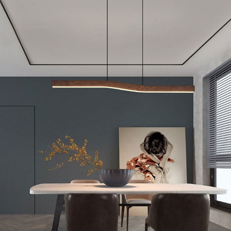 Maintained House Wavy Walnut-Finish Linear Pendant Light - Over a dining table